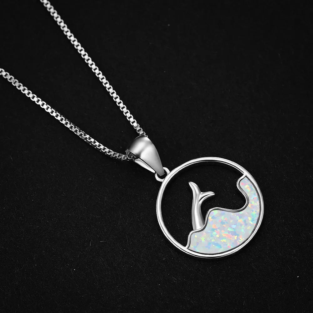 Electroplated copper fishtail necklace with round opal elements in platinum blue finish