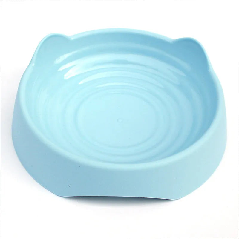 Blue ceramic dog slow feeder bowl with maze design for large breed dogs.