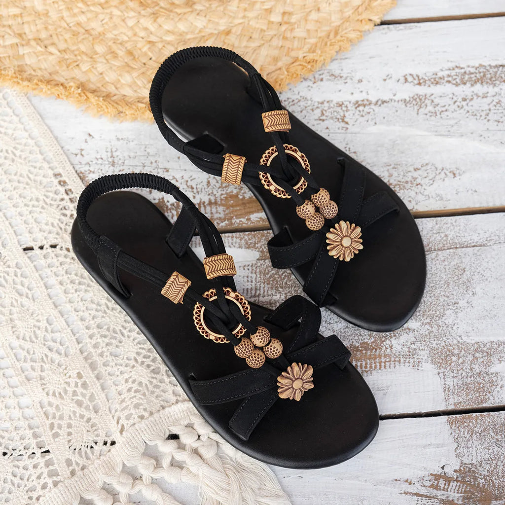 Black ethnic style women's flat beach sandals with beaded weave decoration and elastic band closure
