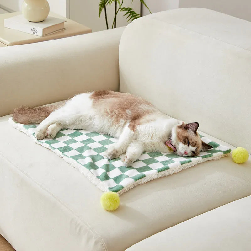 Plaid pattern pet blanket with fur ball decorations in green, pink or yellow colours