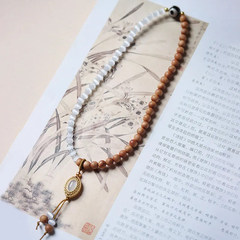 Sandalwood double ring and opal Tibetan bead bracelet with retro mixed material design