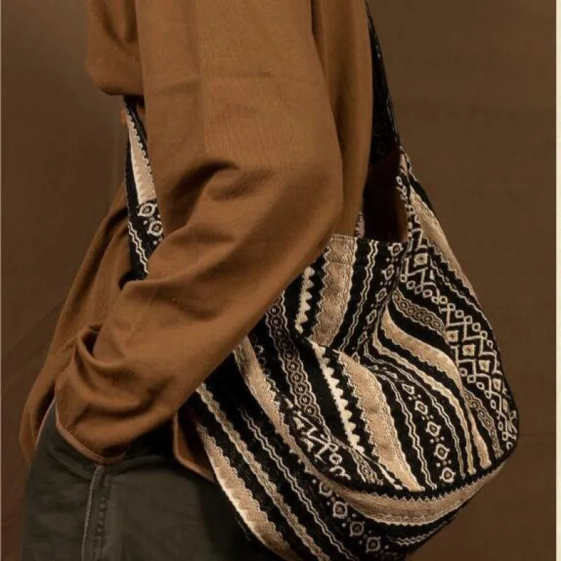 Corduroy vintage striped messenger bag with adjustable shoulder strap and zip closure