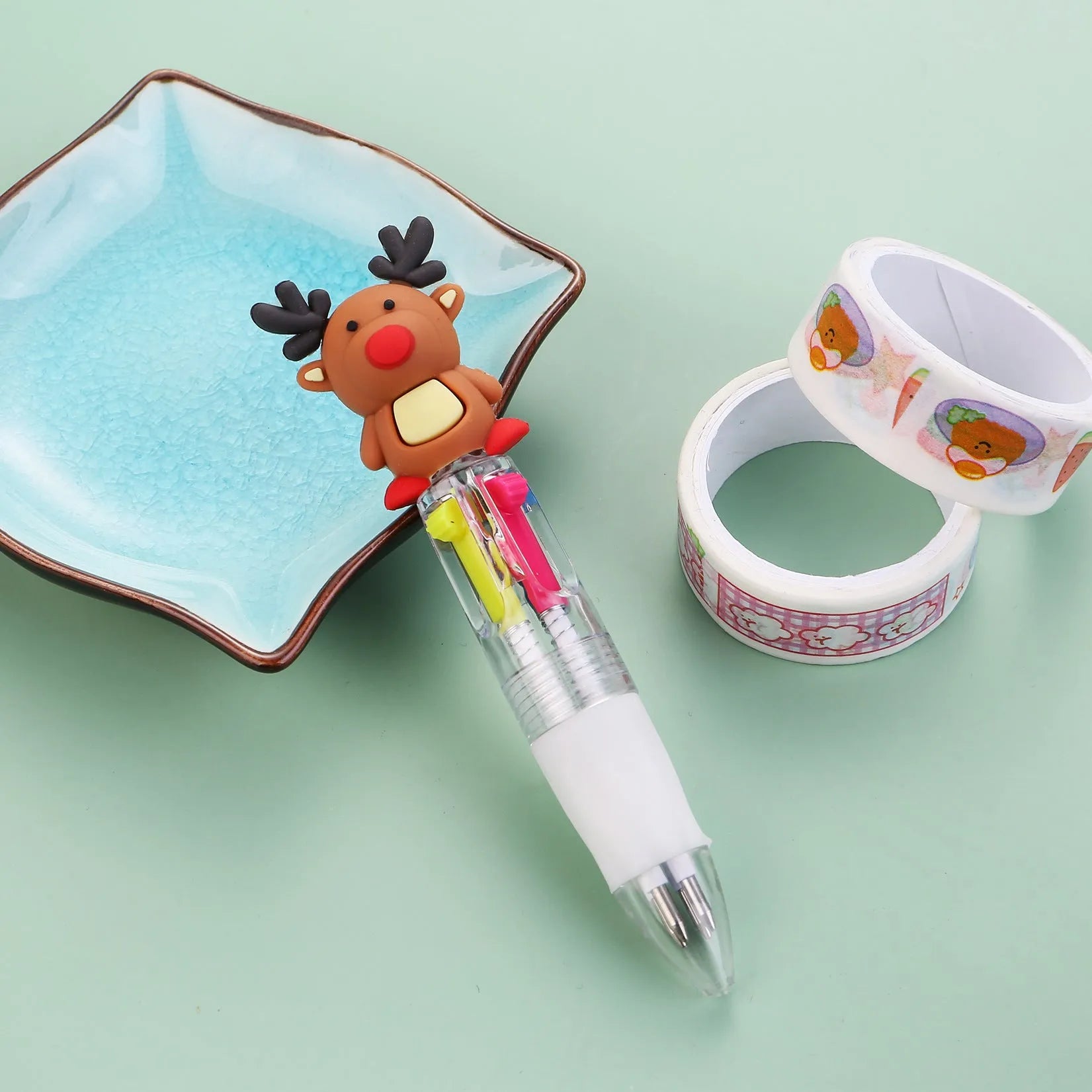 Compact 11cm Christmas four-colour ballpoint pen with press mechanism in festive designs