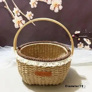 Small hand-woven straw basket in coffee brown colour on a wooden table.