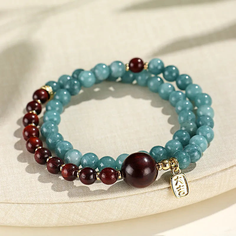 Natural stone blue gold sandalwood beaded bracelet for women with fu character and geometric design
