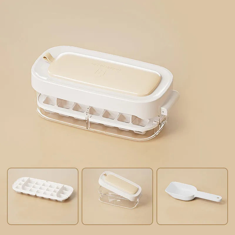 Yellow high-capacity ice cube tray with grid design and a storage slot for an ice shovel.