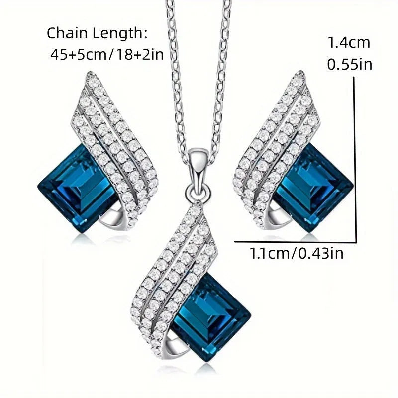 Electroplated alloy necklace and earring set with glass pendant and cross chain design