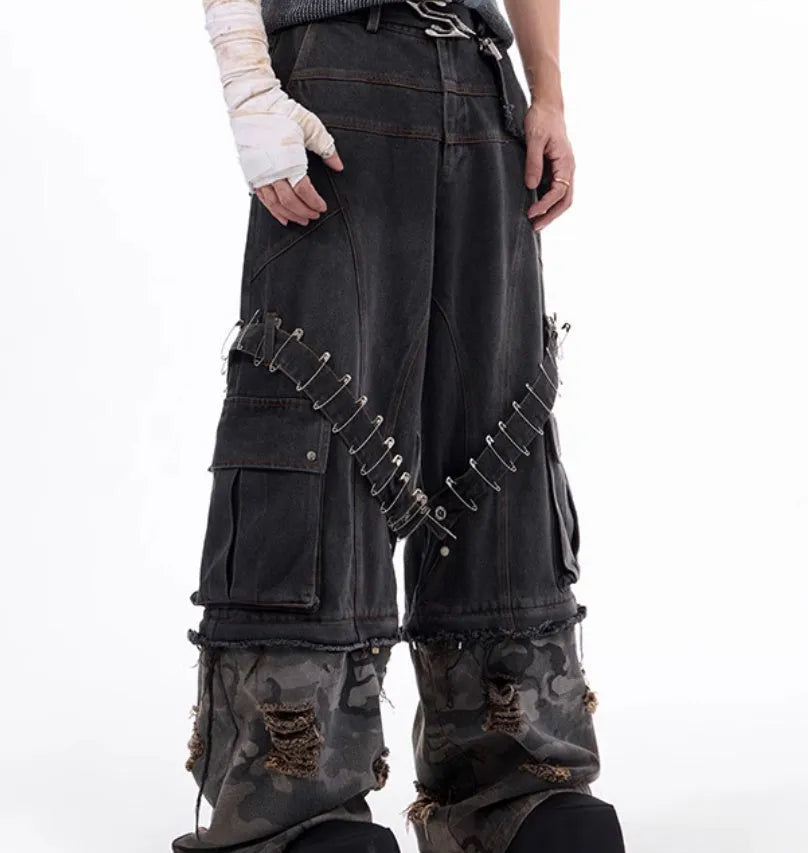 Men's grey camouflage jeans with pin and ribbon splicing detail on the legs.