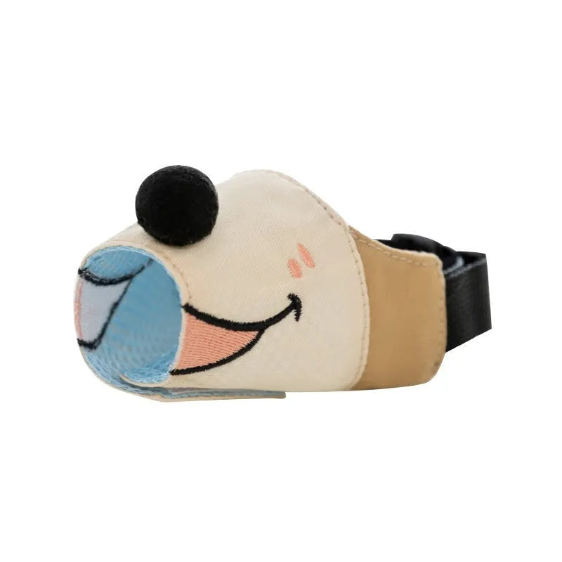 Canvas basket-style dog muzzle in Ollie Brown Bear colour shown on a medium-sized dog.