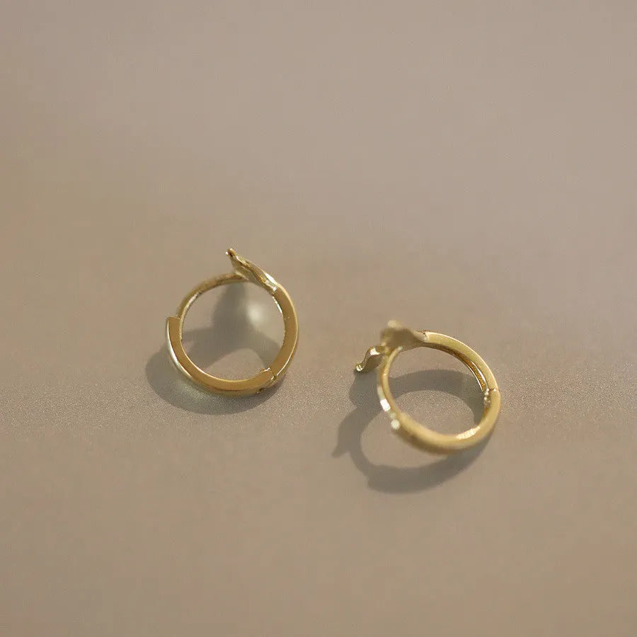 S925 sterling silver fishtail design earrings with gold colour plating and 8mm inner diameter