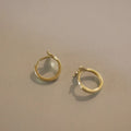 S925 sterling silver fishtail design earrings with gold colour plating and 8mm inner diameter