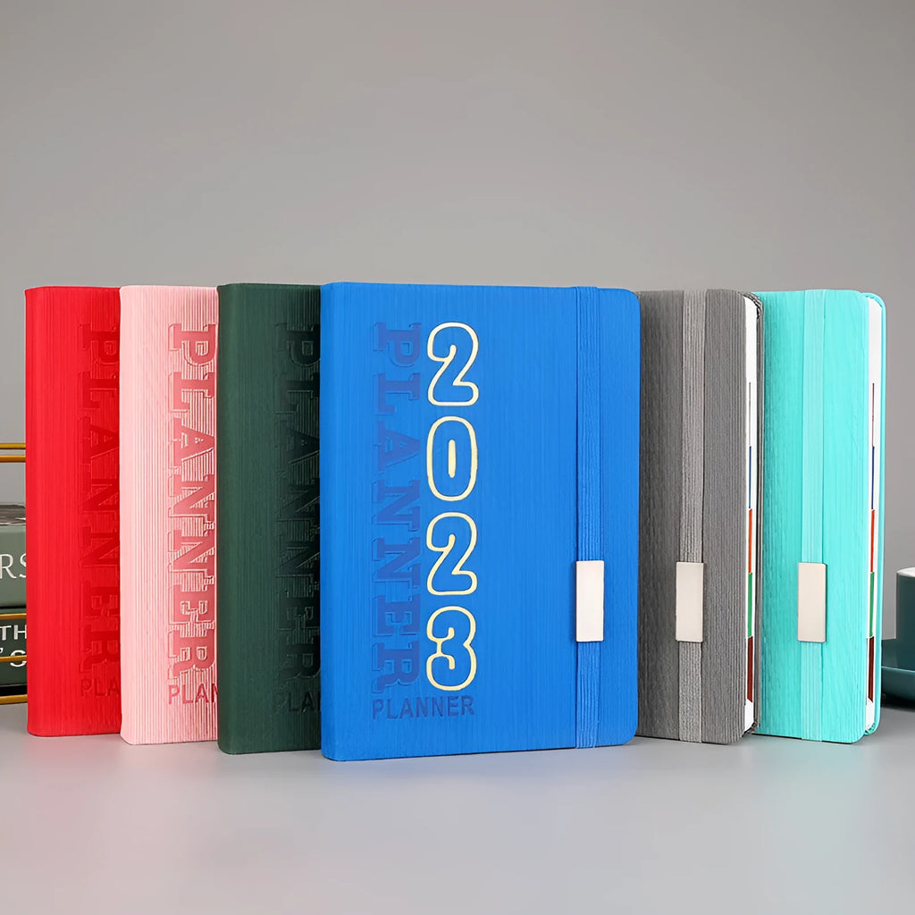 A5 student almanac diary with imitation leather cover showing monthly calendar layout and creative design elements