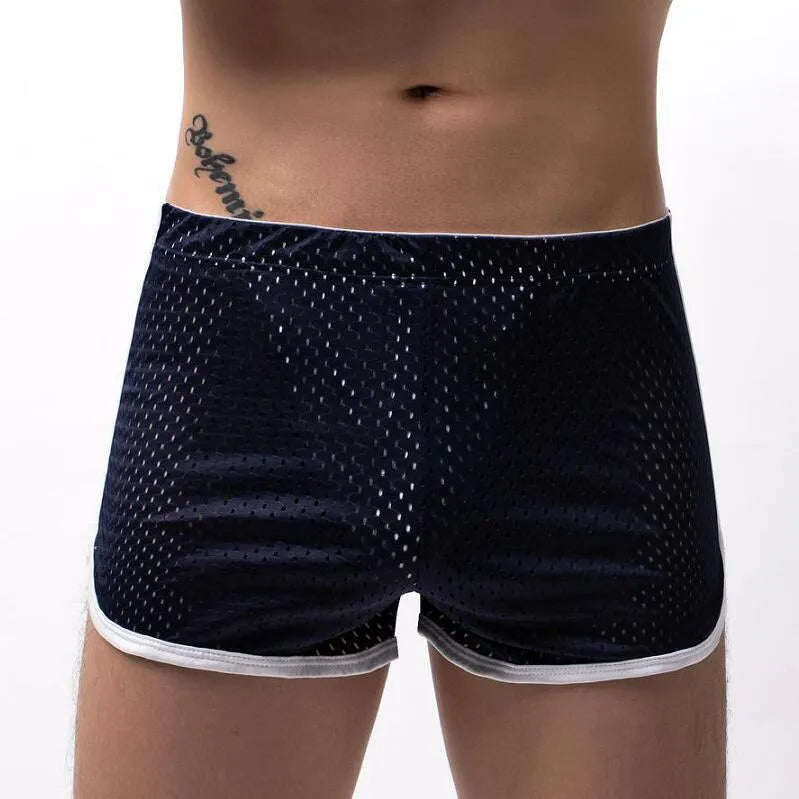Men's three-point boxers in black, gray, and blue showing breathable knitted cotton nylon fabric and mid-waist fit.
