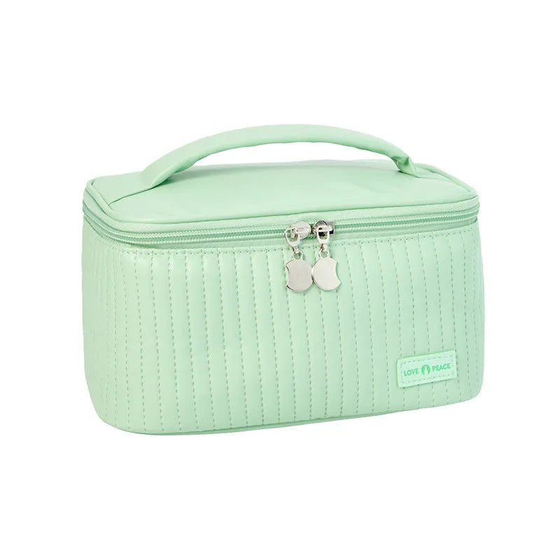Open-top PU leather makeup bag in a choice of six solid colours including pink, coffee, and light blue.
