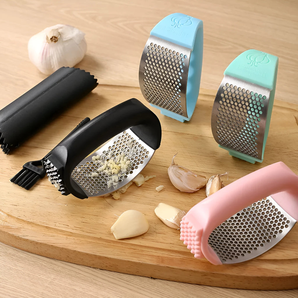 304 stainless steel garlic press in black, blue, green, and pink colour options