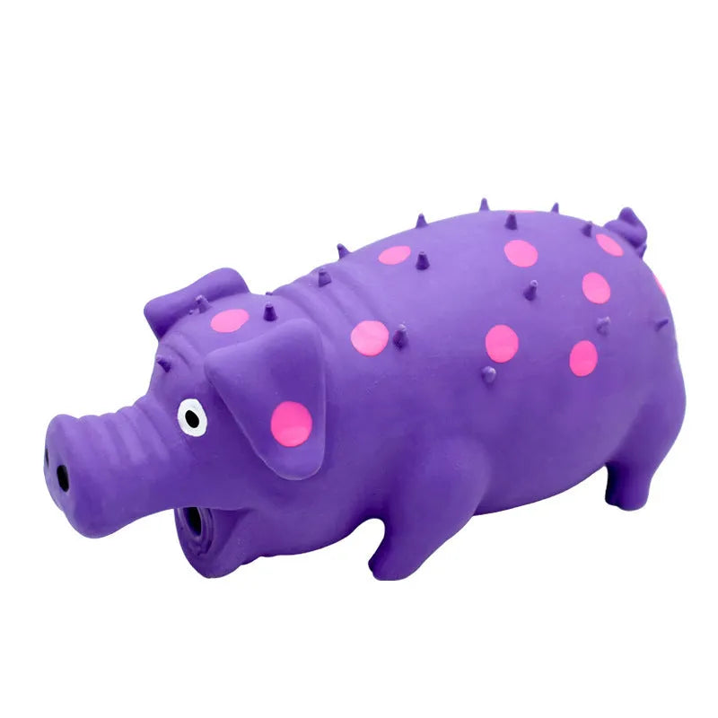 Latex pig-shaped dog chew toy with protruding grain texture in assorted colours