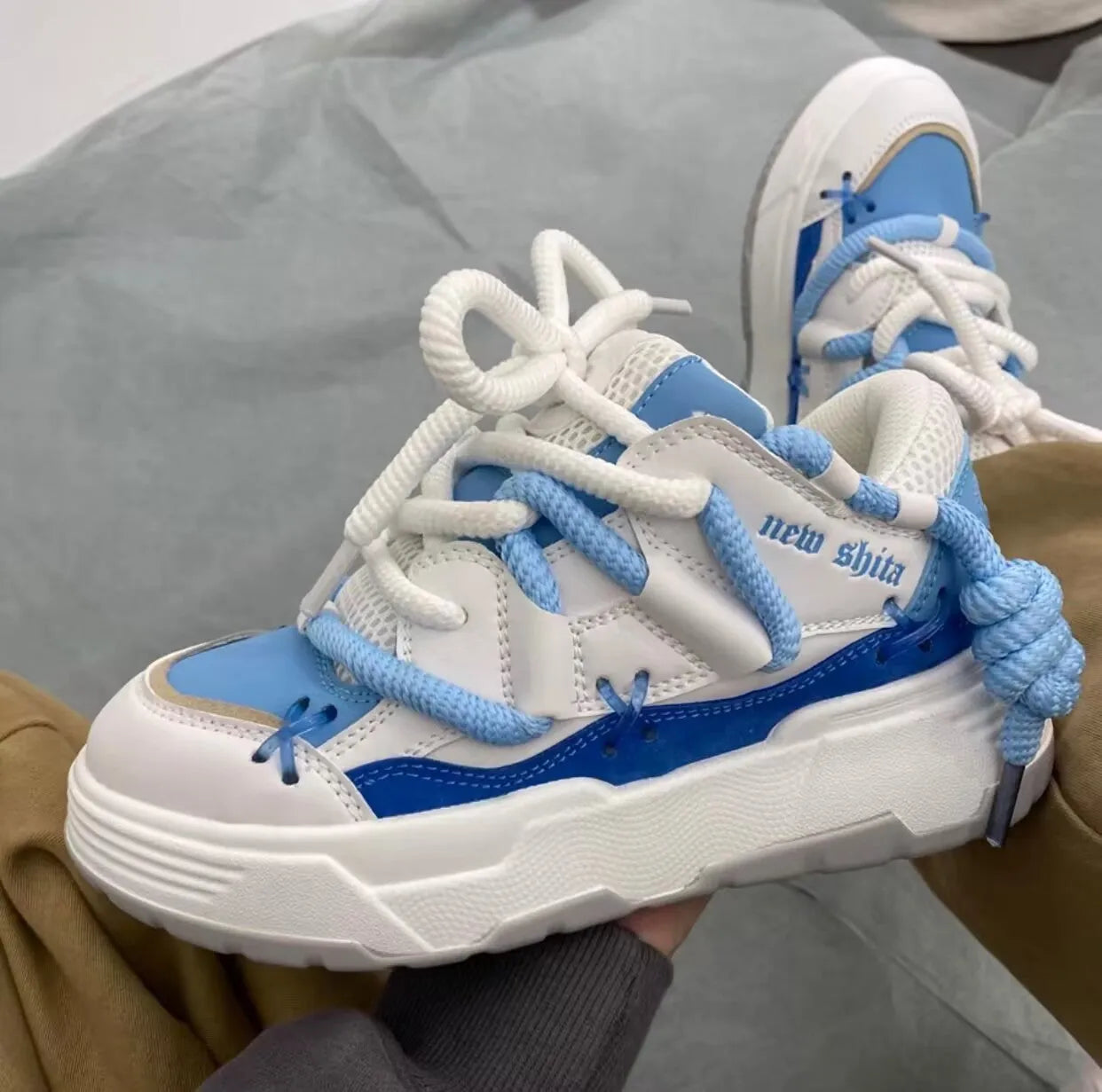 Women's chunky platform sneakers with 6-8cm heel in grey, showing round toe and front tie-up closure