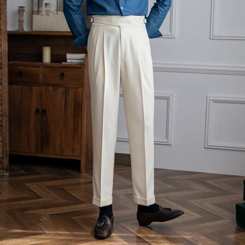 Man wearing black high-waisted straight-leg casual polyester trousers.