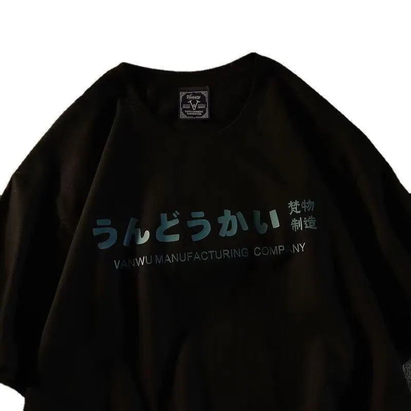 Loose fit black cotton t-shirt with white printed letter design on the chest.