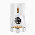 Black and white intelligent pet feeder with automatic timing and quantitative remote feeding via USB power