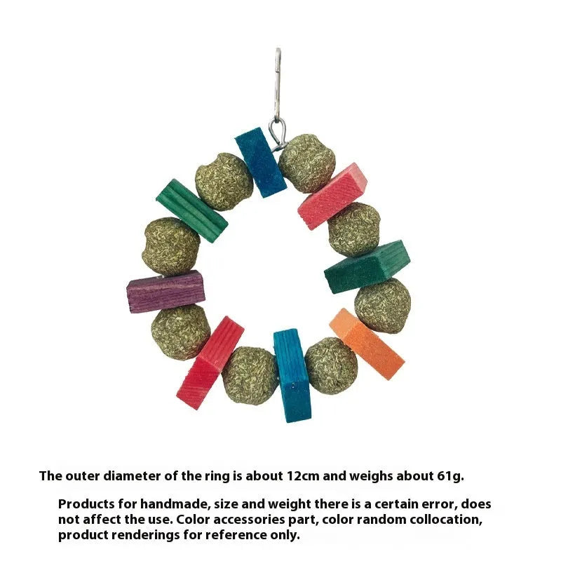Decorative straw ball ring chew toy made from applewood for hamsters and small pets.
