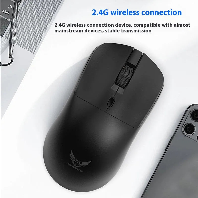 Black wireless mouse with three audio control buttons and scroll wheel