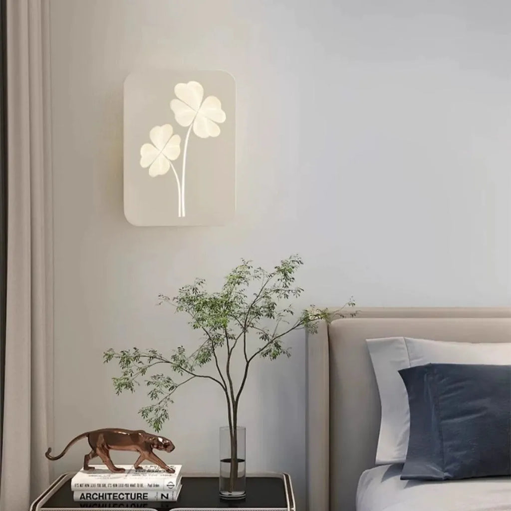 Modern bedside lamp with an acrylic shade showing a love heart motif and three-colour LED light.