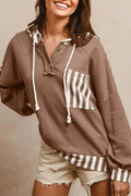 Straw yellow waffle texture striped patchwork hoodie with button neck and drawstring hood.