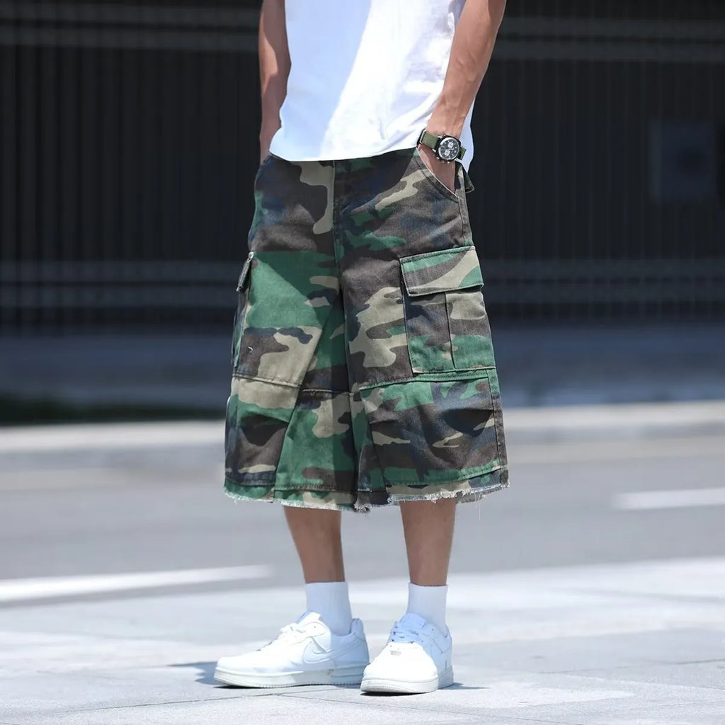 Men's camouflage pattern shorts with retro workwear styling and loose cropped fit
