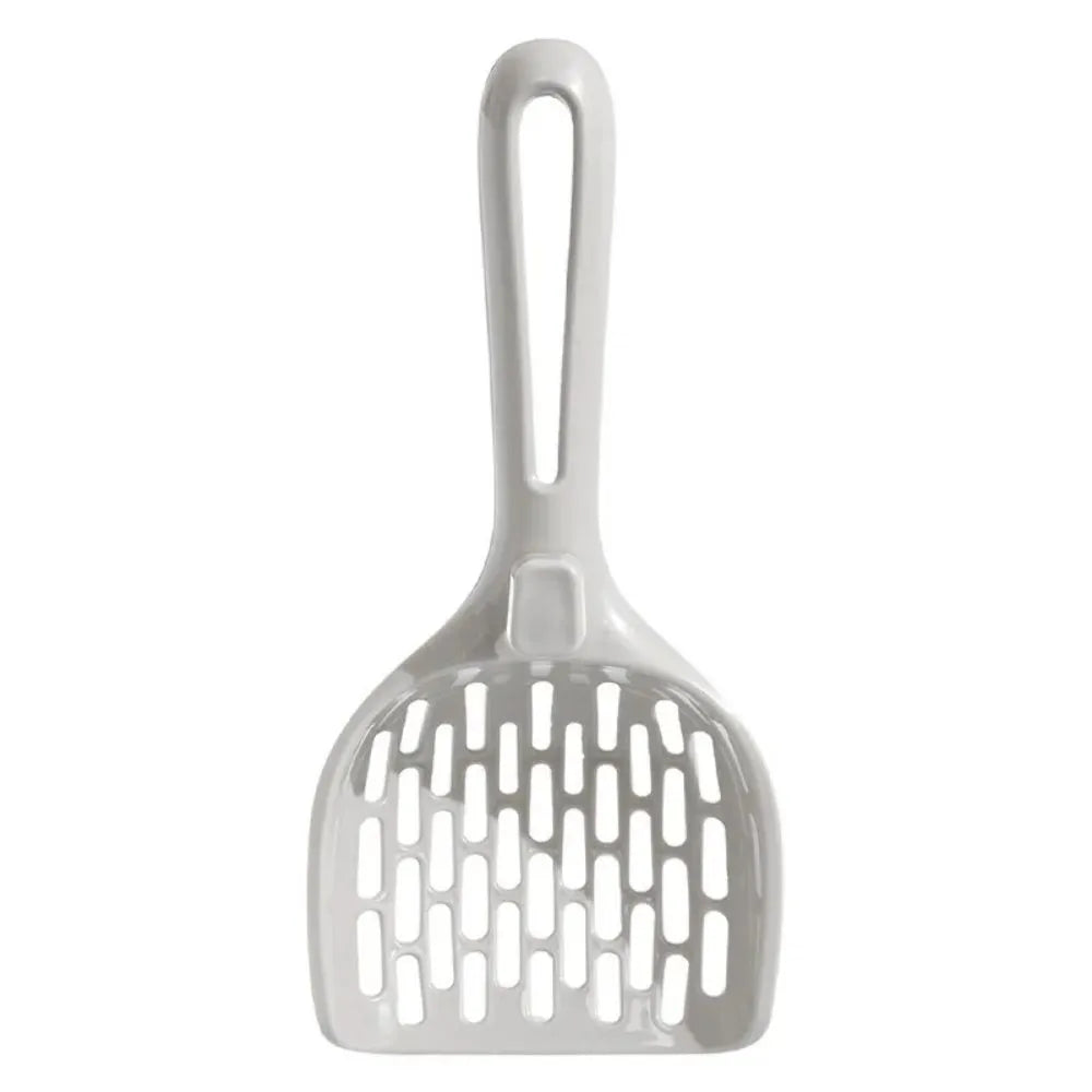 Grey plastic cat litter scoop resting on its matching plastic base stand.