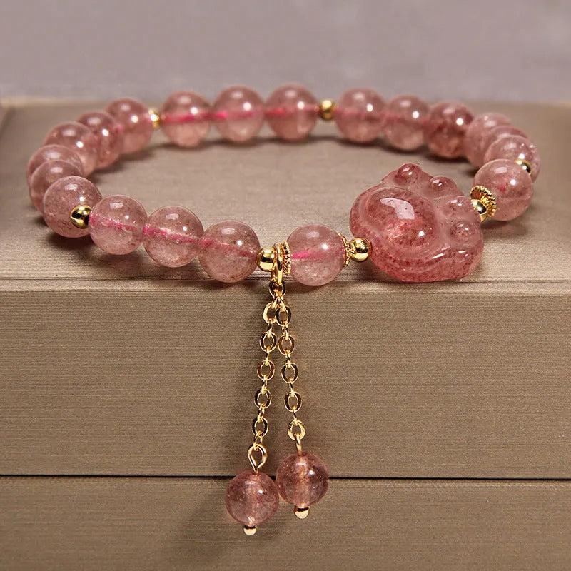 Women's multi-layer crystal bracelet with natural garnet, strawberry quartz, and moonstone pendants in Korean style.