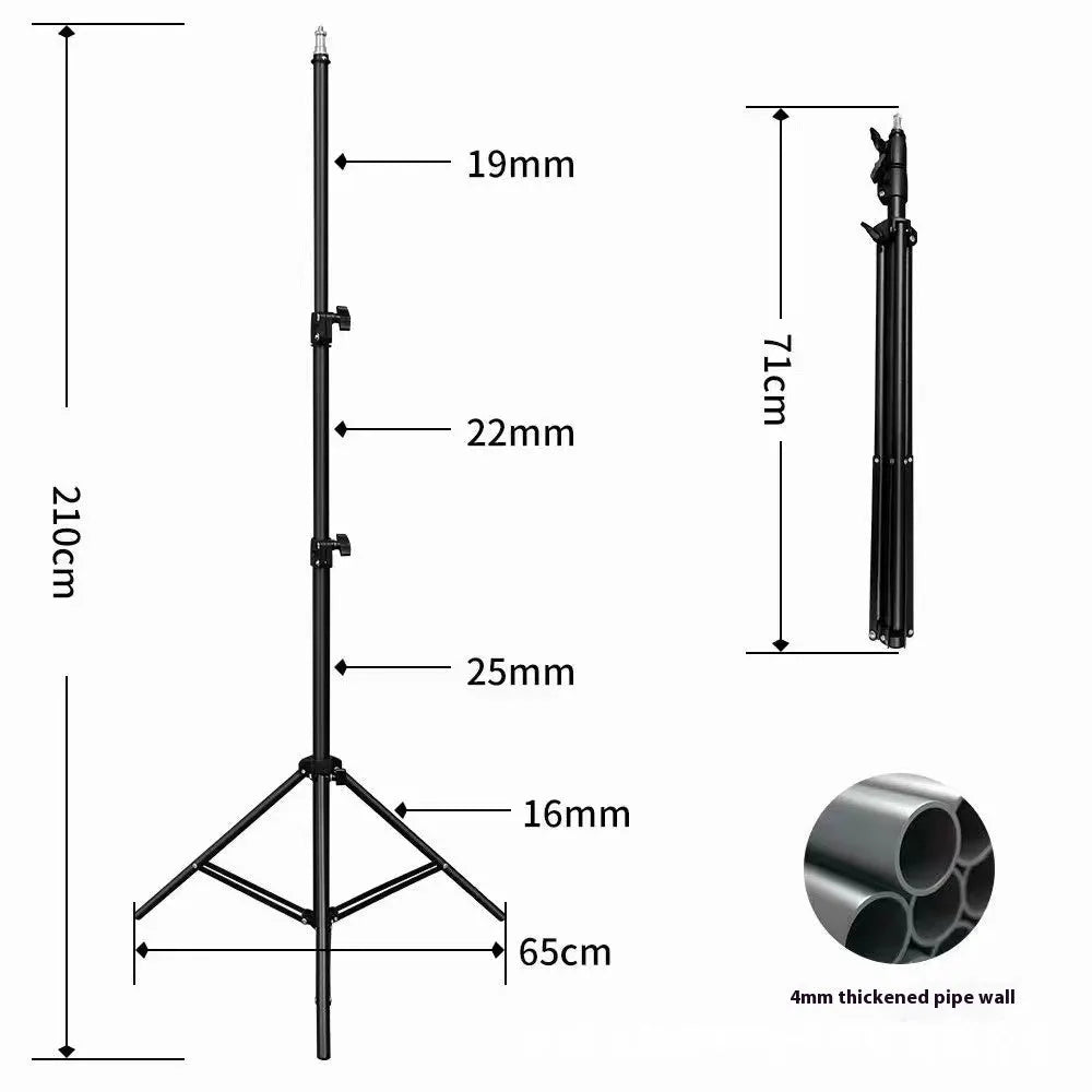 Frosted finish tripod light stand extended to full height with a mobile phone holder attached.