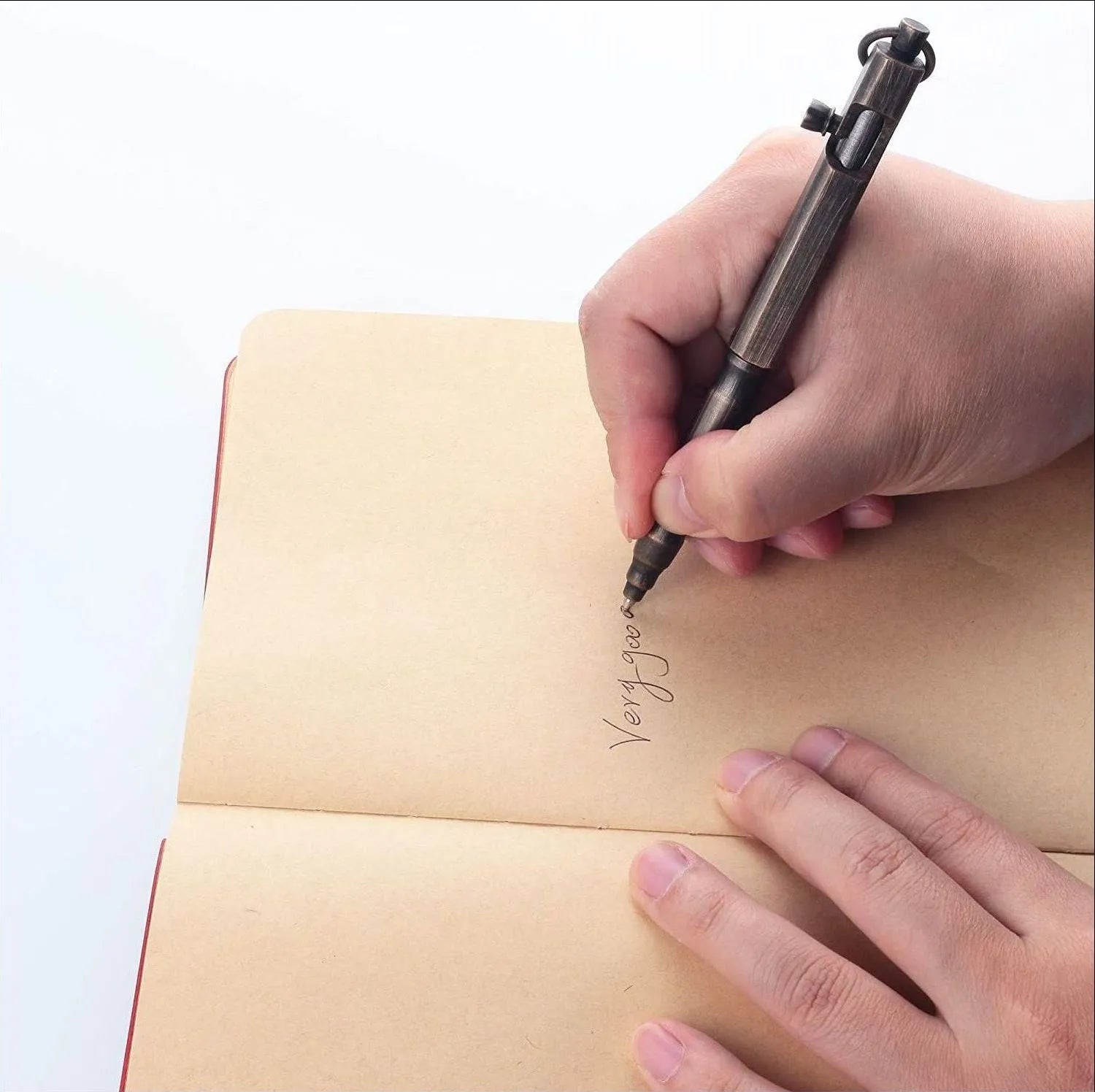 Solid brass hexagonal bolt tactical pen in brass and black finishes, showing machining detail.