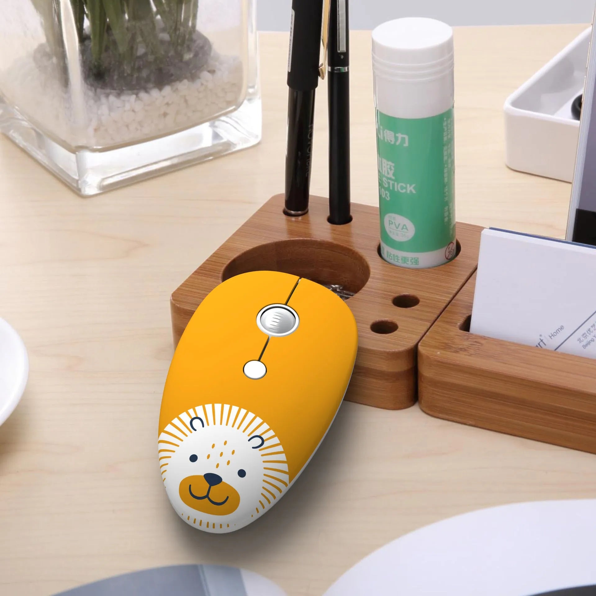 A compact wireless USB mouse for laptops shown in a blue rabbit character design.
