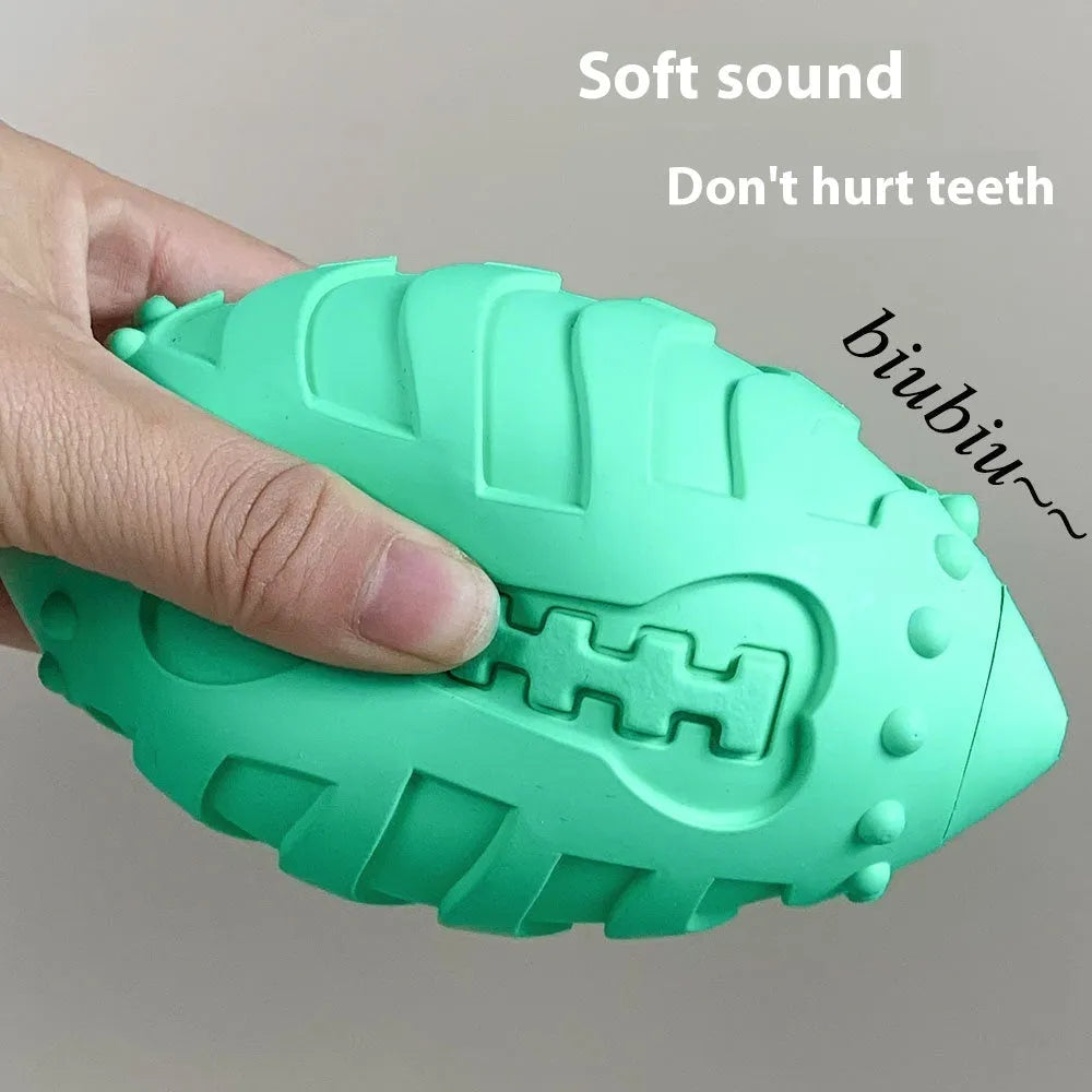 Bite-resistant light green rubber rugby ball dog toy for teeth cleaning and training