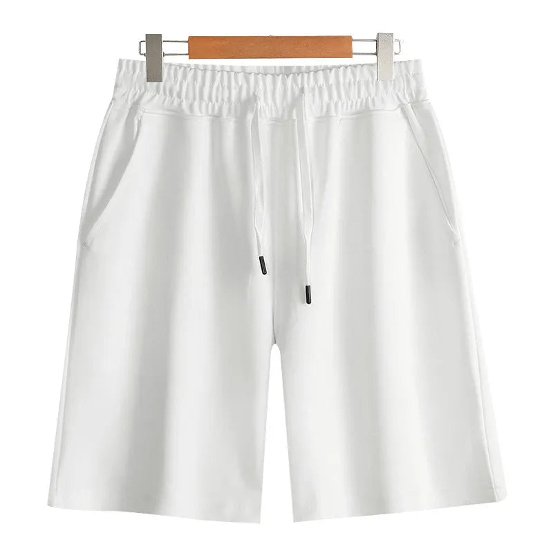 Cotton straight-leg summer shorts in light grey shown on a hanger