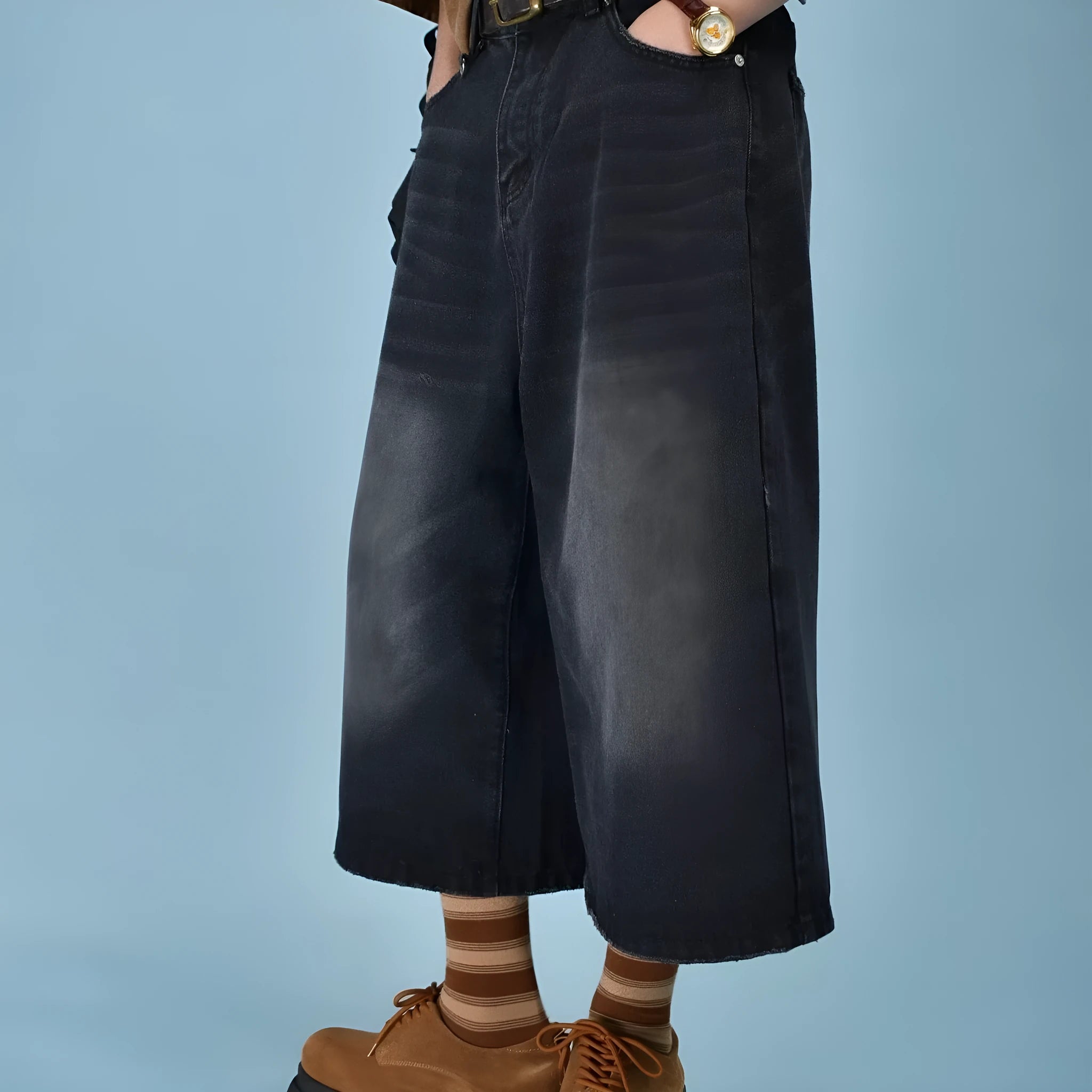 Men's straight-leg denim shorts in blue, shown with a loose fit for summer.