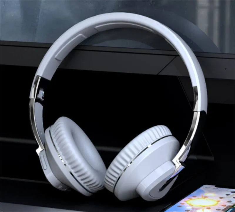 H3 wireless Bluetooth over-ear headset in black, showing earcup with controls, AUX jack, and TF card slot.