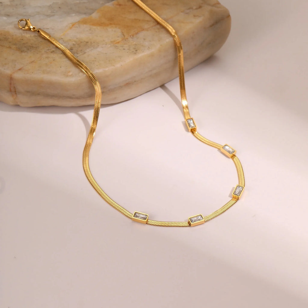Geometric square zircon necklace with flat snake chain in gold colour finish