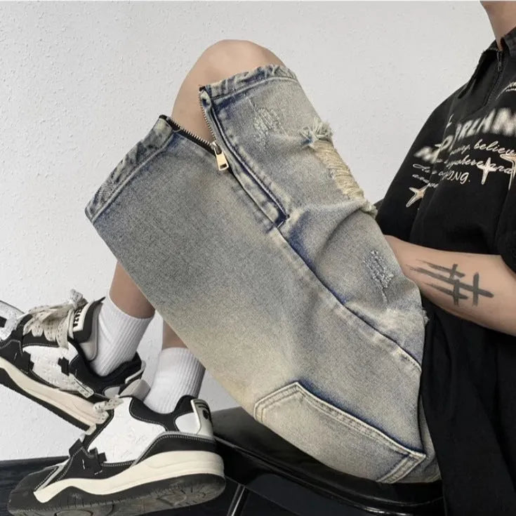 Blue retro denim shorts with tattered detailing and wide leg cut for summer wear