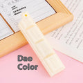 Chocolate ballpoint pen with cartoon food design in pink, beige, and brown colours