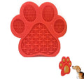 Blue bone-textured silicone dog licking mat with suction cups on a white tile background.