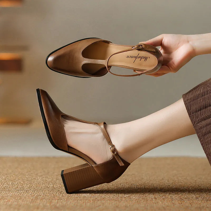 Women's dark brown retro pointed toe Mary Jane shoes with Baotou hollow design and a buckle strap.