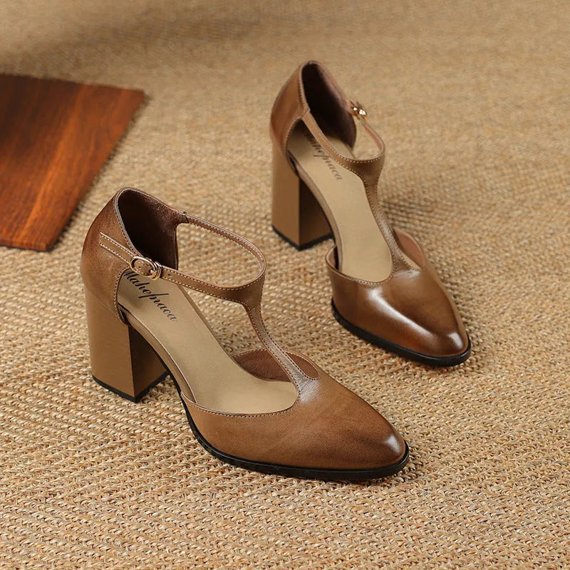 Women's dark brown retro pointed toe Mary Jane shoes with Baotou hollow design and a buckle strap.