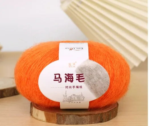 Mohair wool ball for DIY scarf knitting in assorted colours on white background