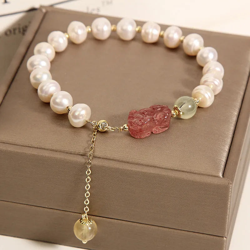 Women's multi-layer crystal bracelet with natural garnet, strawberry quartz, and moonstone pendants in Korean style.
