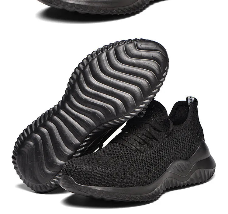 Men's black safety work shoes with steel toe caps and low-cut design for industrial use