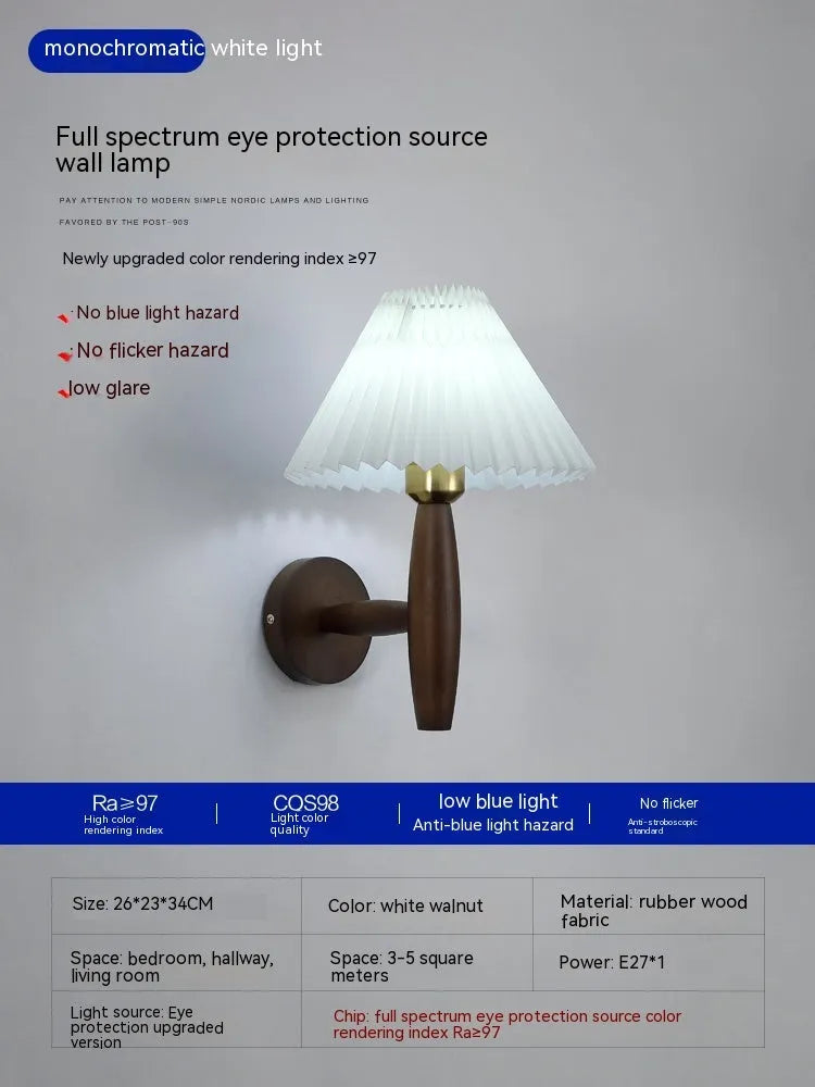 American retro style adjustable wall lamp in walnut wood with a fabric shade, mounted beside a bed.