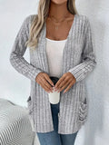 Solid colour long sleeve cardigan with pockets in loose fit design available in black and granny grey