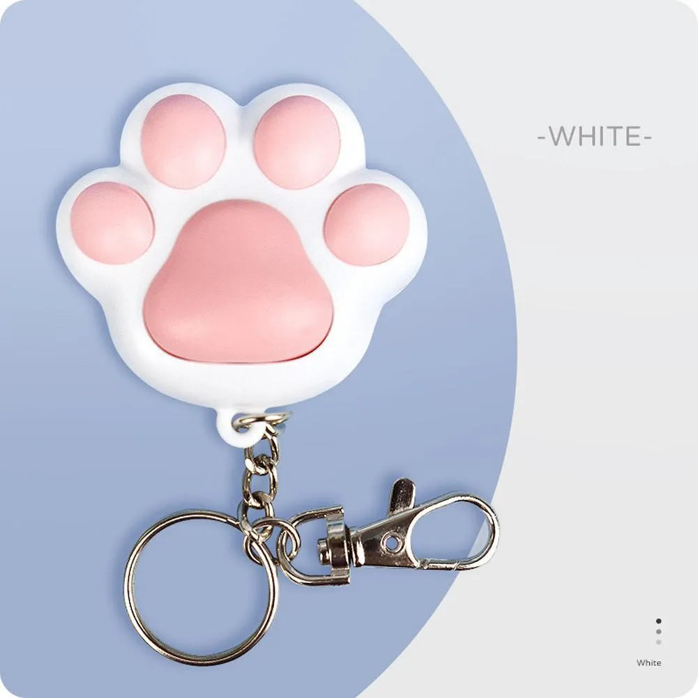 Pink and black plastic USB rechargeable infrared cat teaser toy on a keyring